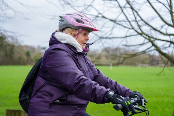 A woman riding a bike